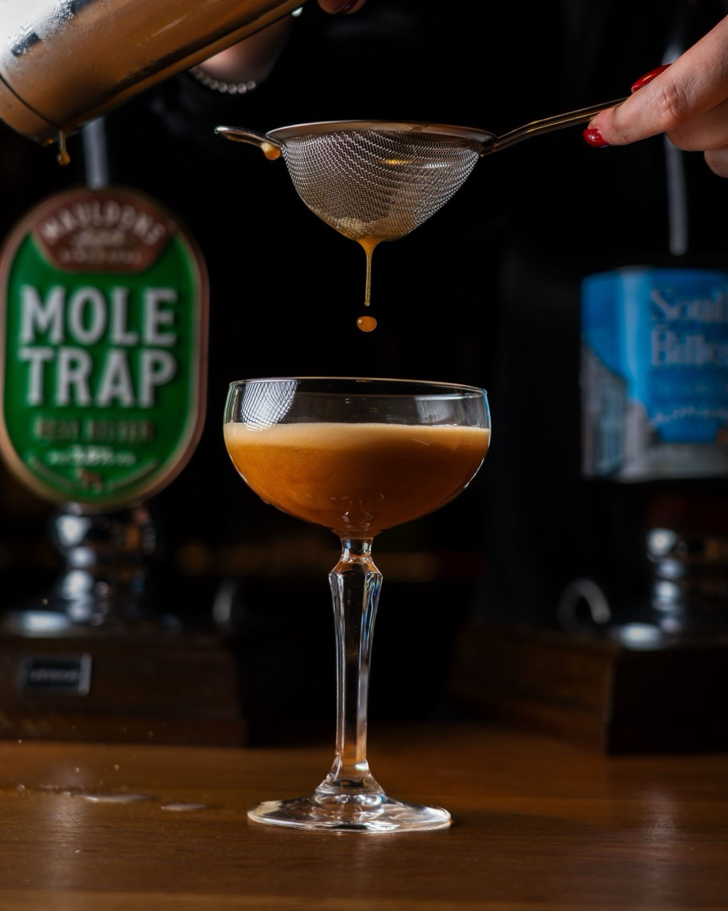 Cocktails on the bar at The Peacock Inn